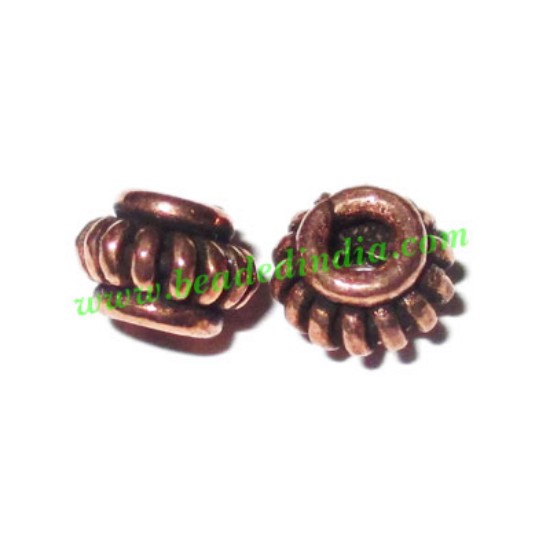Picture of Copper Metal Beads, size: 4.5x6.5mm, weight: 0.64 grams.