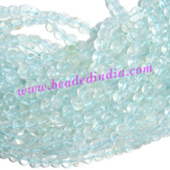 Picture of Aquamarine 4mm round semi precious gemstone beads.