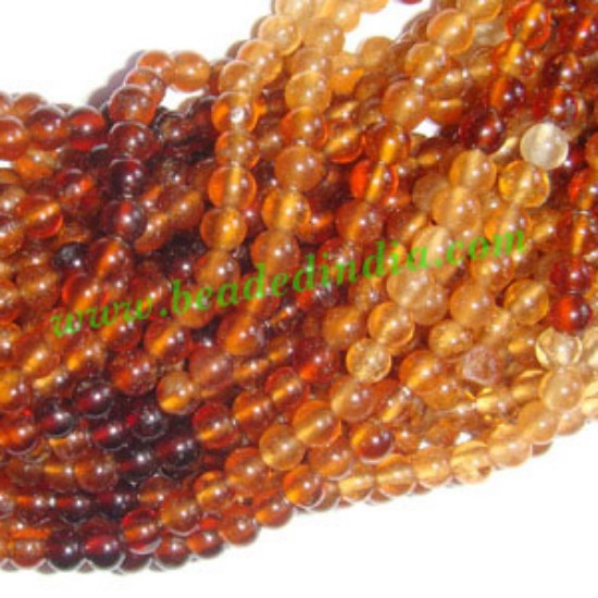 Picture of Hessonite 4mm round semi precious gemstone beads.