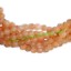 Picture of Moonstone Peach 4mm round semi precious gemstone beads.