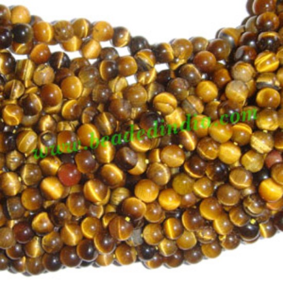 Picture of Tiger Eye 4mm round semi precious gemstone beads.