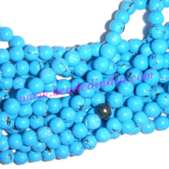 Picture of Turquoise 4mm round semi precious gemstone beads.