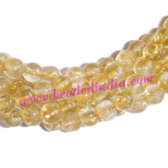 Picture of Citrine 6mm round semi precious gemstone beads.