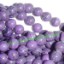 Picture of Sugilite 8mm round semi precious gemstone beads.